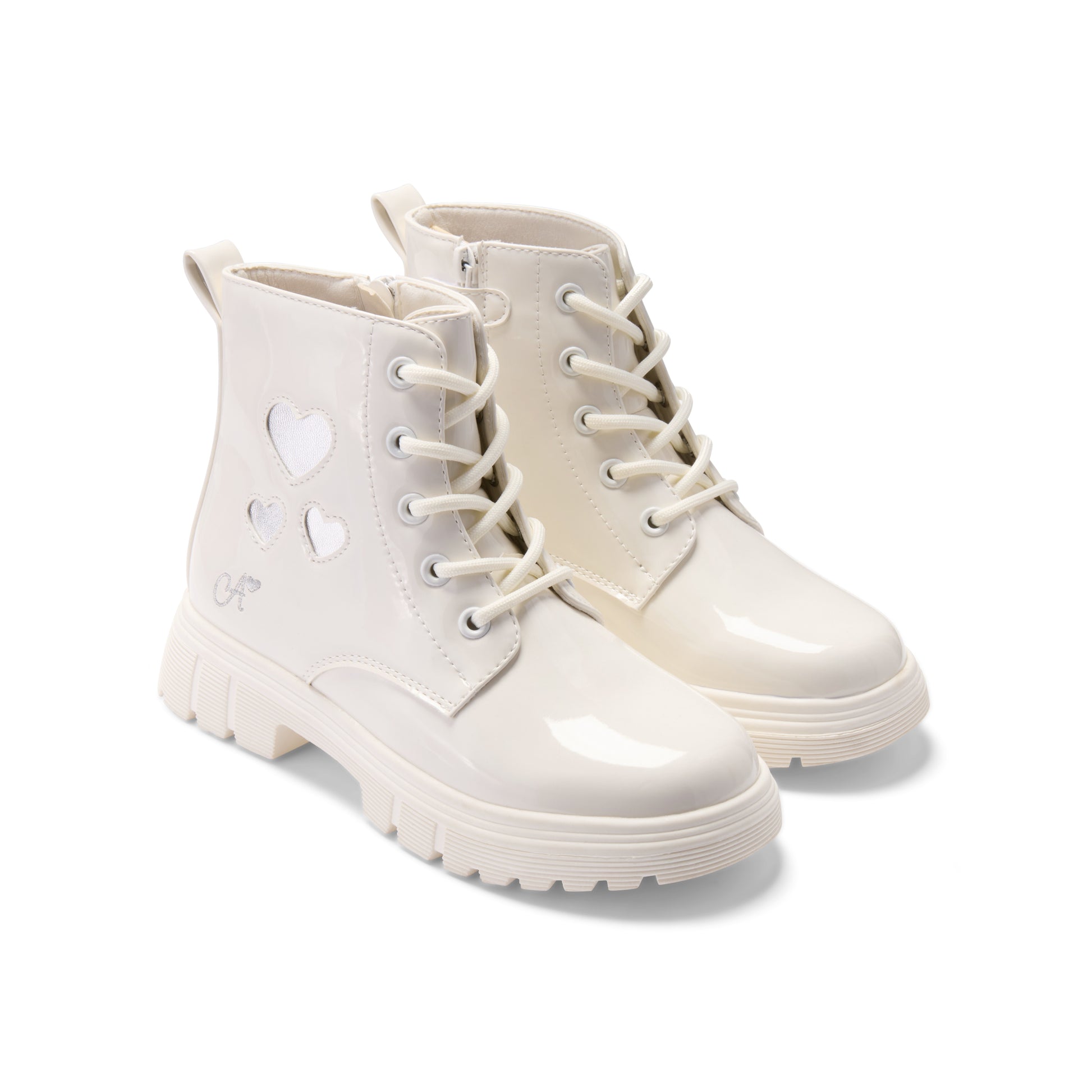White boots with heart designs on a white background