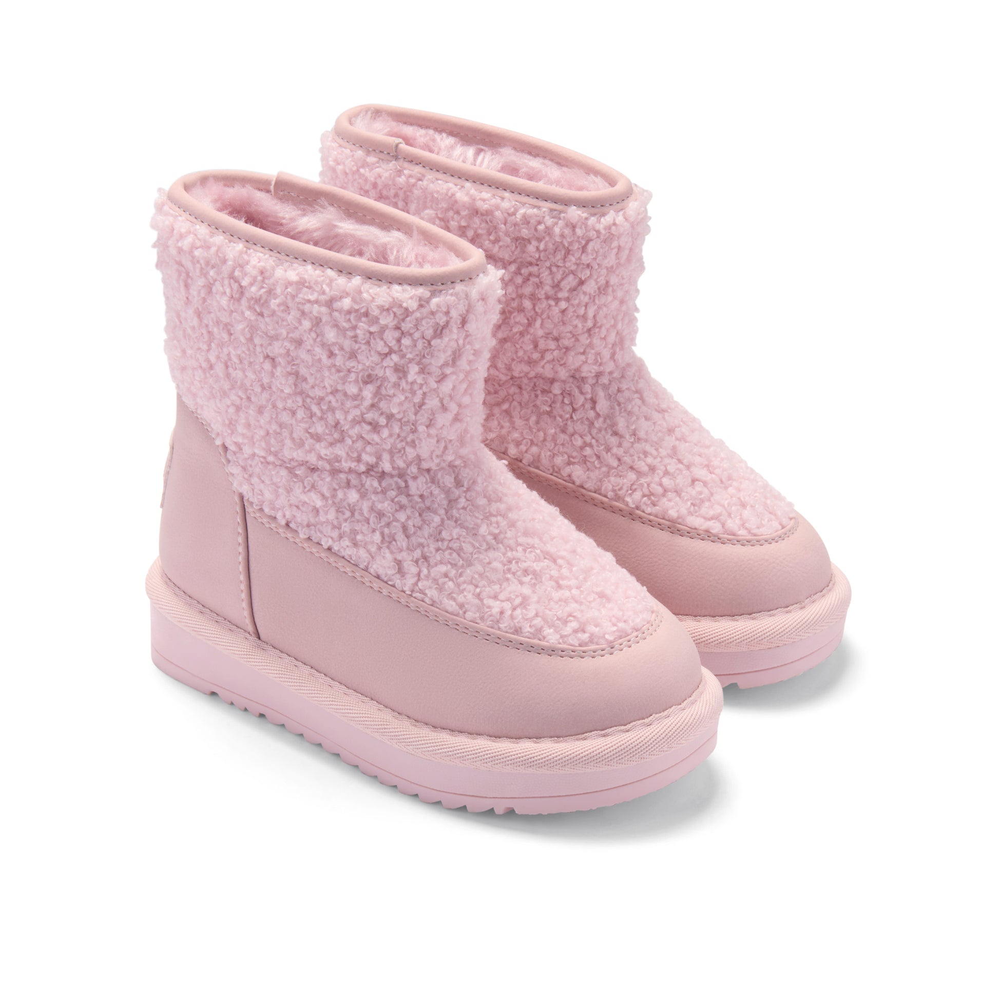 A pair of light pink toddler winter boots featuring a plush, sherpa-like fleece collar and a smooth synthetic lower body with a thick, flexible sole, shown against a plain white background.